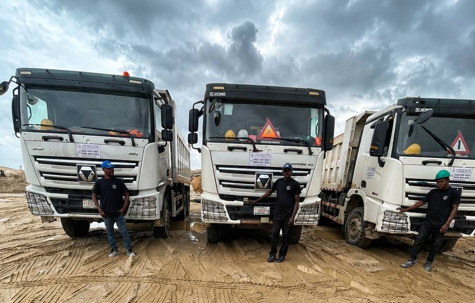Truck and worker managing logistics fleet
